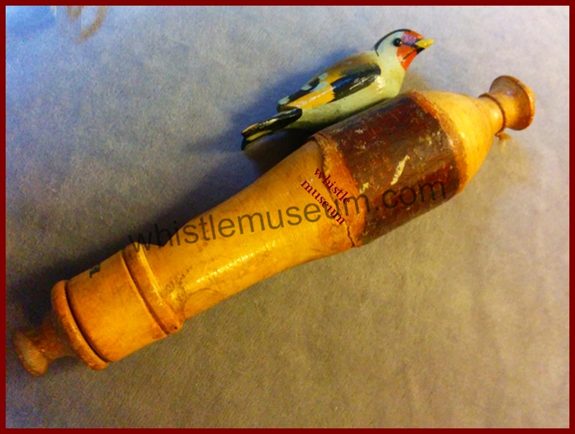 Victorian wood whistle made for thye U.S.A market, with a birdie on top, , two notes, whistle museum