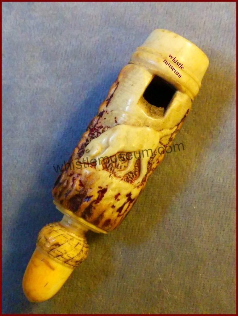 Viictorian acron top round pea whistle with a hunting dog relief, early to mid 19th century antler horn , whistle museum