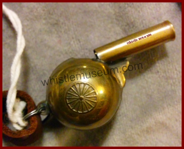 Alfred DeCourcy 19th century short Buson whistle for Bicycle riders , with wheel relif , whistle museum